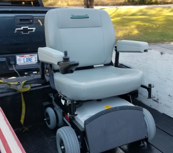 Local disabled veteran presented with donated electric mobility chair